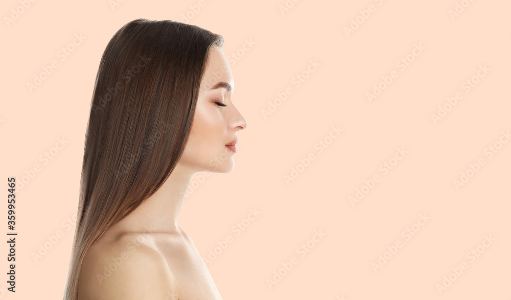 Naklejka premium Young woman with beautiful face on light background, space for text