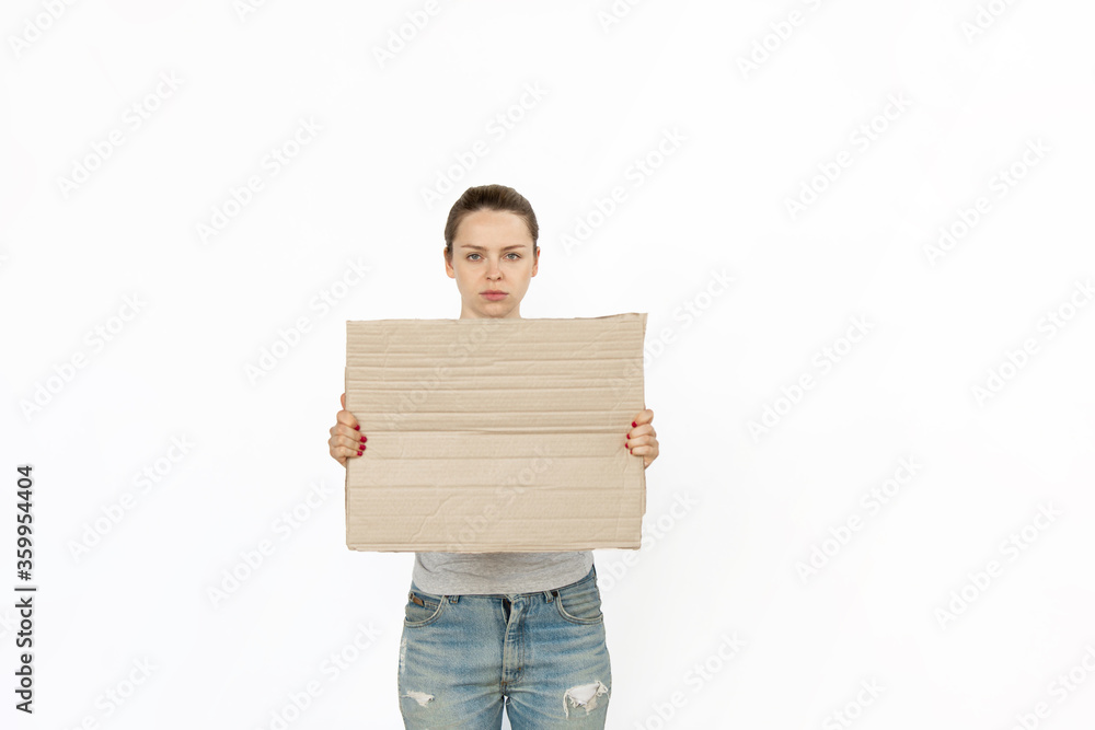 Young woman protesting with blank board, sign isolated on white studio background. Activism, active social position, protest, actual problems. Meeting against human rights, abusing, freedom of choice. Young woman protesting with blank board, sign isolated on white studio background. Activism, active social position, protest, actual problems. Meeting against human rights, abusing, freedom of choice.