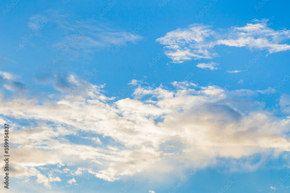 White clouds cumulus floating on blue sky for backgrounds concept
