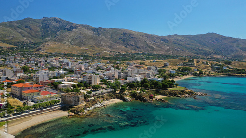 Fototapeta Naklejka Na Ścianę i Meble -  Aerial drone photo of famous seaside town and port of Karistos in South Evia island, Greece