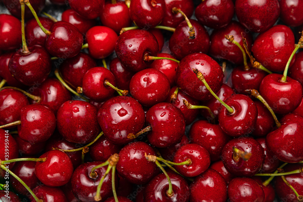 Fresh ripe black cherries background Top view Fresh ripe black cherries background Top view