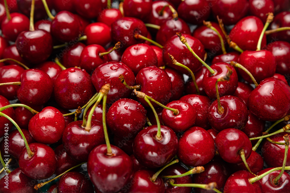 Fresh ripe black cherries background Top view Fresh ripe black cherries background Top view