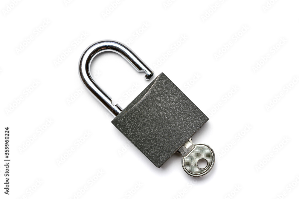 Key isolated. Metal lock pad or padlock on white background. Privacy security concept. Key isolated. Metal lock pad or padlock on white background. Privacy security concept.