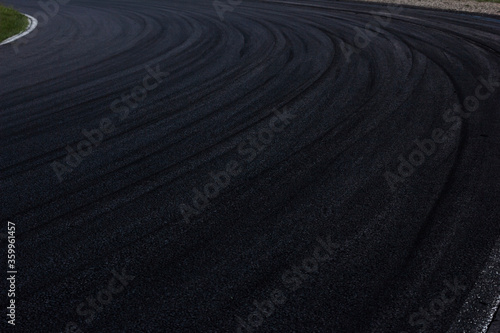 Motor Racing Track Corner Apex / Tire tracks on asphalt © patruflo