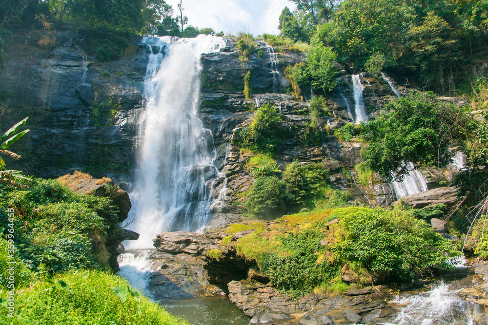 Water fall located in deep rain forest jungle named 