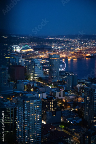 City Lights and Downtown Seattle skyline cityscape as seen at night from the Space Needle. 