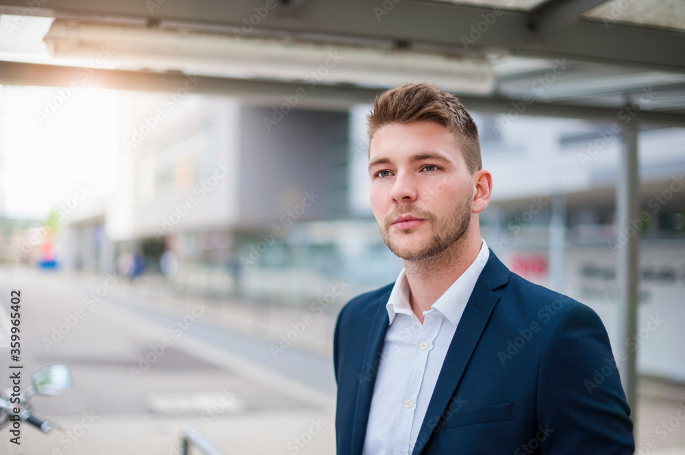 Portrait of a young businessman in the city Portrait of a young businessman in the city