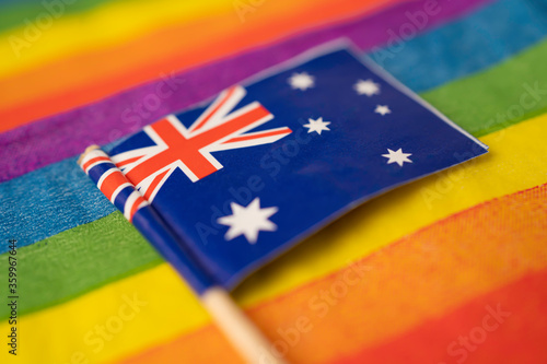 Australia flag on rainbow background symbol of LGBT gay pride month  social movement rainbow flag is a symbol of lesbian, gay, bisexual, transgender, human rights, tolerance and peace.