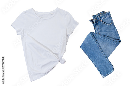 Empty white tshirt and blue denim on white background, black t-shirt mock up and blue jeans, blank t shirt © paulcannoby