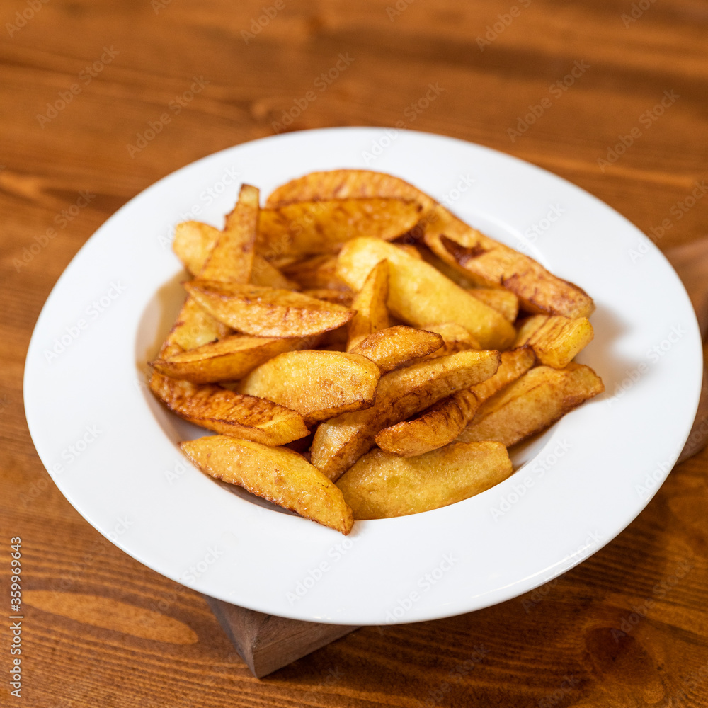 Fried tasty potato close up Fried tasty potato close up