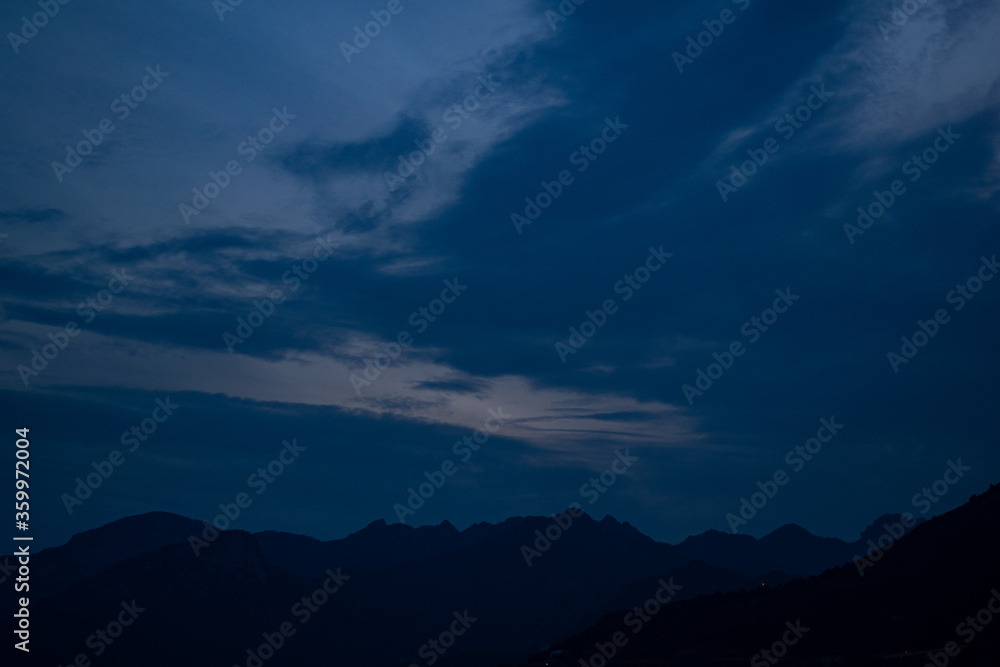 Fototapeta premium blue sunset in the mountains