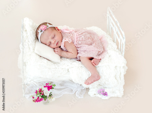 Sleeping newborn baby girl