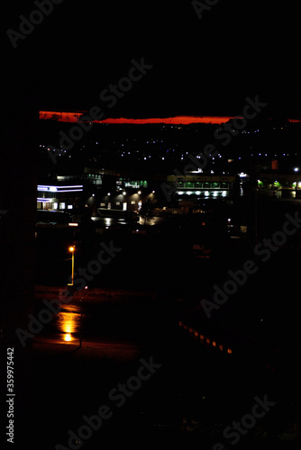 after sunset red sky in the city view from the balcony