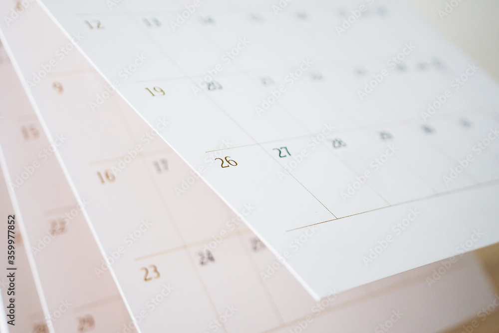 Calendar page flipping sheet close up blur background business schedule planning appointment meeting concept Calendar page flipping sheet close up blur background business schedule planning appointment meeting concept