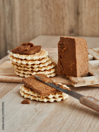 Viennese waffles with Norwegian brunost cheese. Breakfast with Traditional Scandinavian brown cheese photo