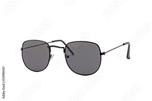 Black rectangular sunglasses with round bottom clear lenses and thin golden frames isolated on white background. Side View.