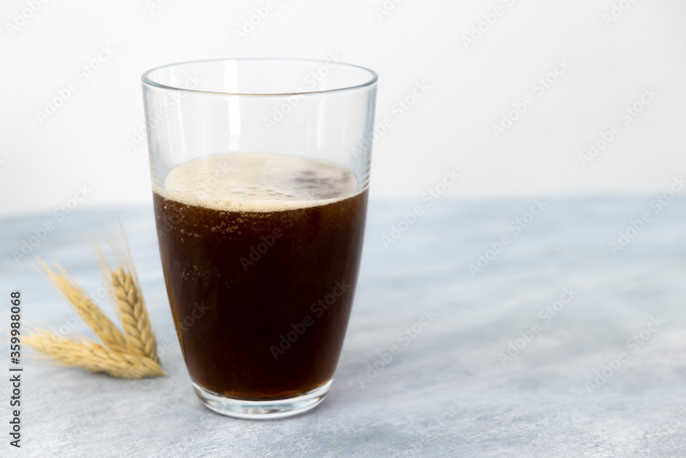 Traditional Russian drink kvass on wooden table Traditional Russian drink kvass on wooden table