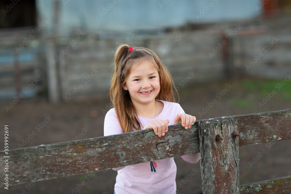 Little girl with long hair and no front teeth Stock Photo | Adobe Stock