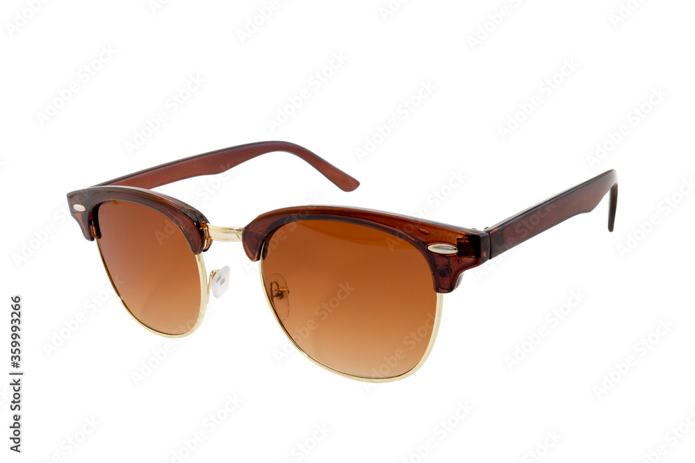 Brown horn rimmed flat top clubmaster sunglasses with round bottom golden frames and clear gradient brown lenses isolated on white background. Side View. Brown horn rimmed flat top clubmaster sunglasses with round bottom golden frames and clear gradient brown lenses isolated on white background. Side View.