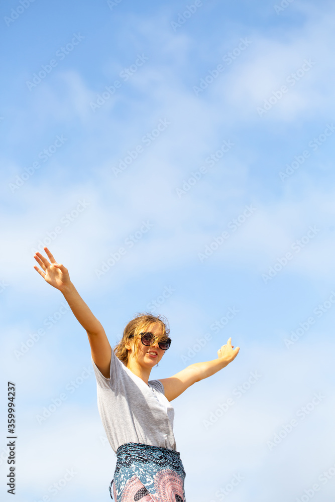 Looking up at girl with arms out Looking up at girl with arms out