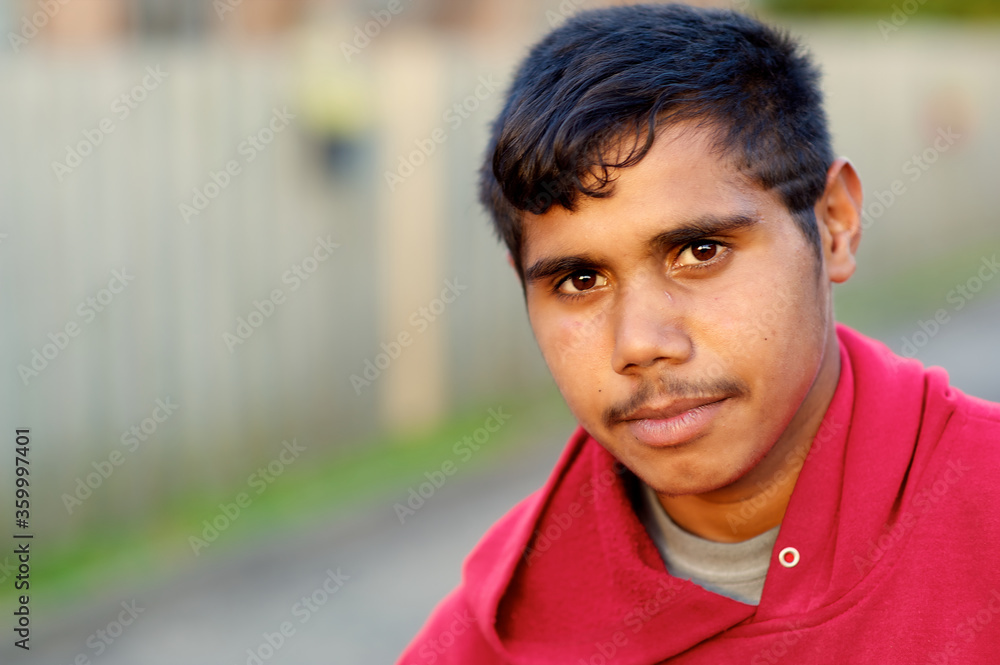 Aboriginal Australian Teenager in Red Hoodie Aboriginal Australian Teenager in Red Hoodie