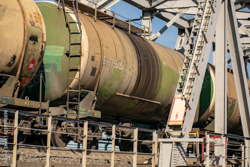 Transportation of crude oil in barrels by rail.