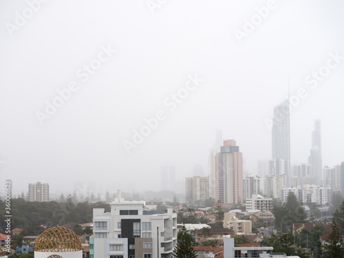 Tall Gold Coast buildings in misty rain photo