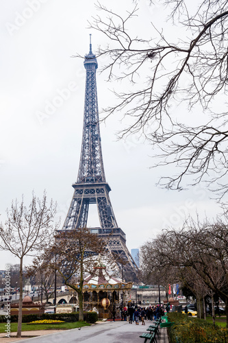 Carrousel and the famous Tour Eiffel in Paris in a cold winter day