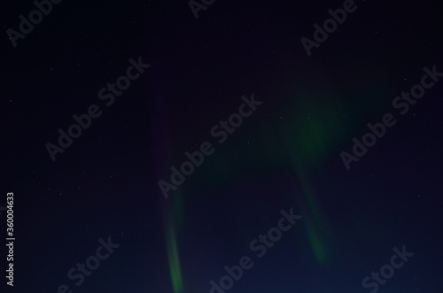 aurora borealis on night sky in fall