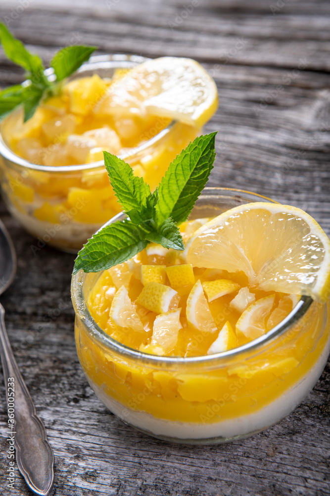 Tasty creamy dessert with lemon