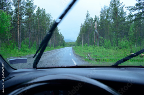 rain on car windshield from inside car