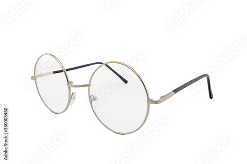 Street style oval prescription glasses with thin silver metal frame, clear lens, isolated on white background, side view.