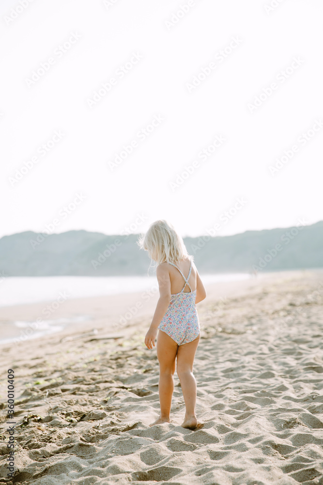 Little girl on the beach in France Little girl on the beach in France