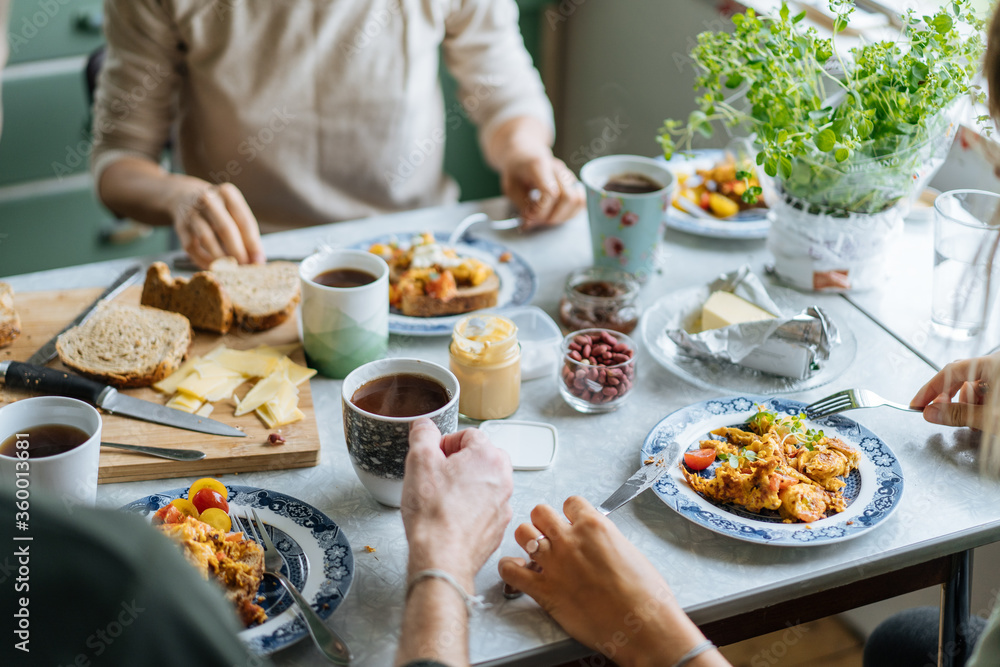 Crop family enjoying breakfast food Crop family enjoying breakfast food