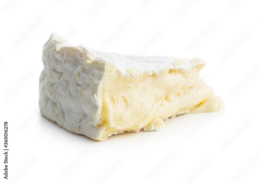Brie cheese. White soft cheese with white mould.