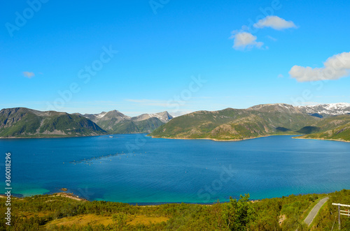 deep blue fjord and mighty mountains