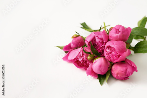 Peony bouquet. Rich bunch of peonies. Greeting card for mother's day. Women's Day. Valentine's Day. Copy space. Spring or summer greeting card with flowers.Wedding invitation.Happy Birthday