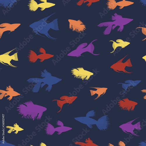 Seamless vector pattern with colored fishes on a blue background. Aquarium fishes. © Jane