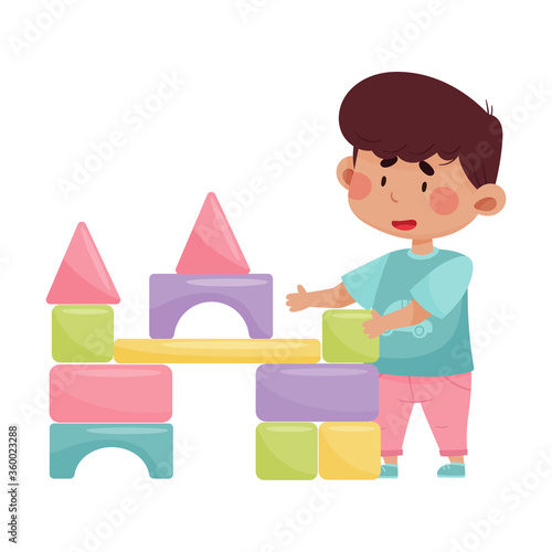 Cheerful Boy Carrying Blocks to Build a Tower Vector Illustration