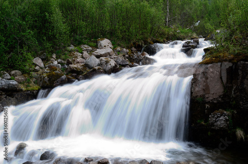 majestic mountain waterfall in northern norway