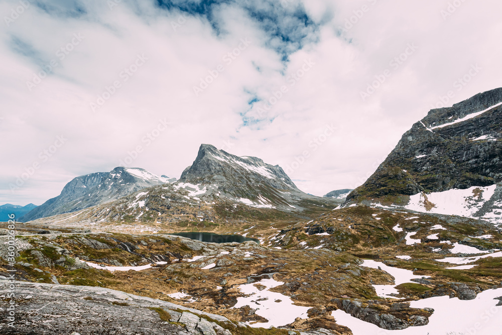 Reinheimen National Park, Norway. Lake Ovstevatnet In Mountains Landscape In Early Summer. Mountain Range In One Of The Largest Wilderness Areas Still Intact In Western Norway