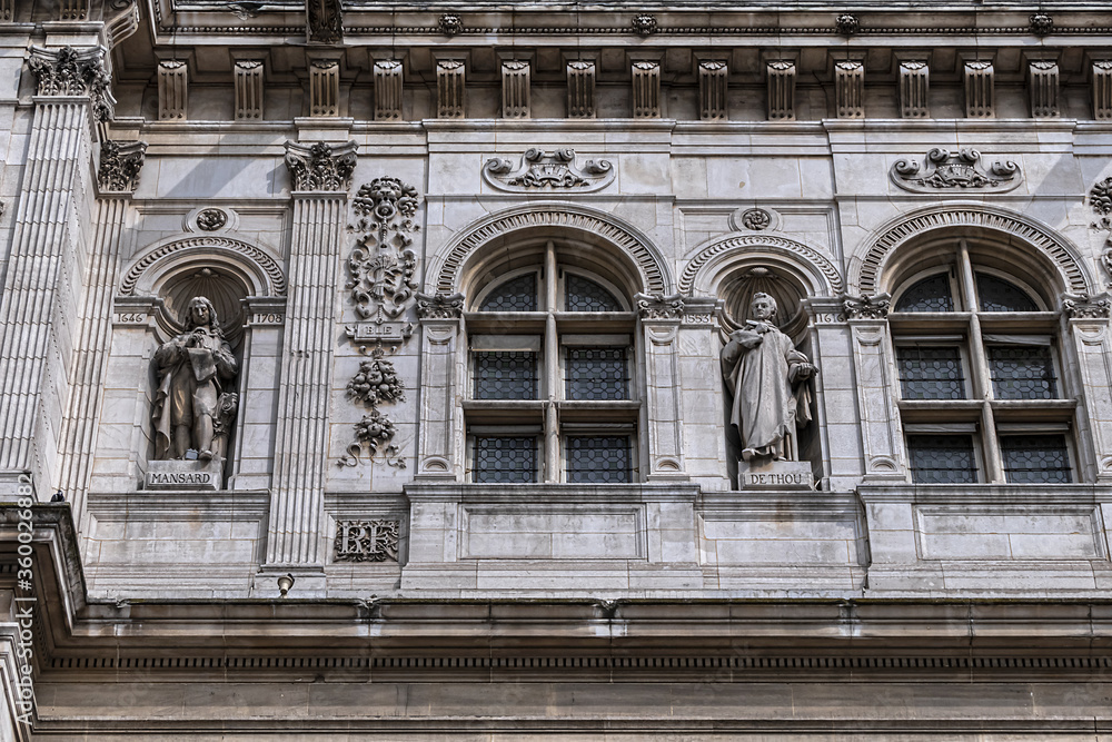 Paris Hotel-de-Ville architectural fragments. Paris Hotel-de-Ville - Neo-Renaissance building of City Hall. Paris's City administration has been located on the same location since 1357. Paris, France. Paris Hotel-de-Ville architectural fragments. Paris Hotel-de-Ville - Neo-Renaissance building of City Hall. Paris's City administration has been located on the same location since 1357. Paris, France.
