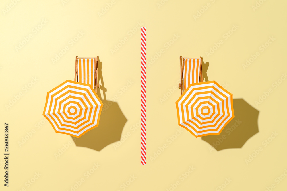 Top view of the beach with sunbeds and umbrellas time after the