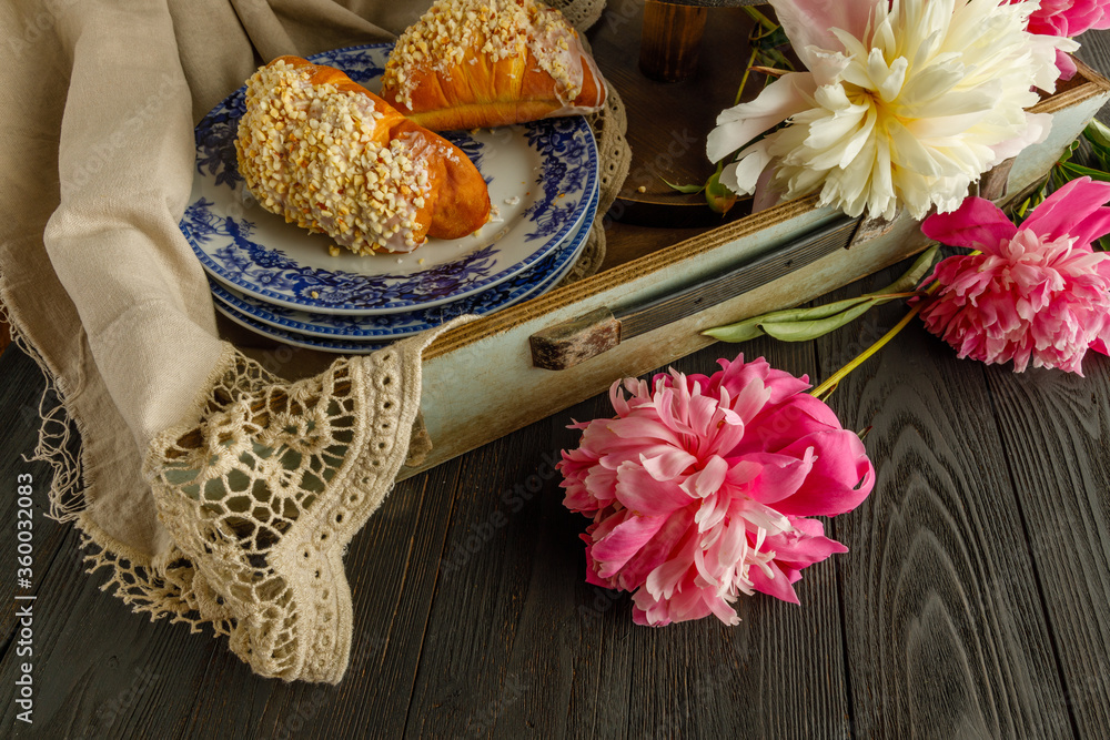 breakfast pastries served with flowers, retro style breakfast pastries served with flowers, retro style