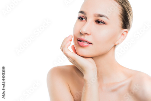 Portrait of a beautiful girl who touches her skin, portrait on a white isolated background