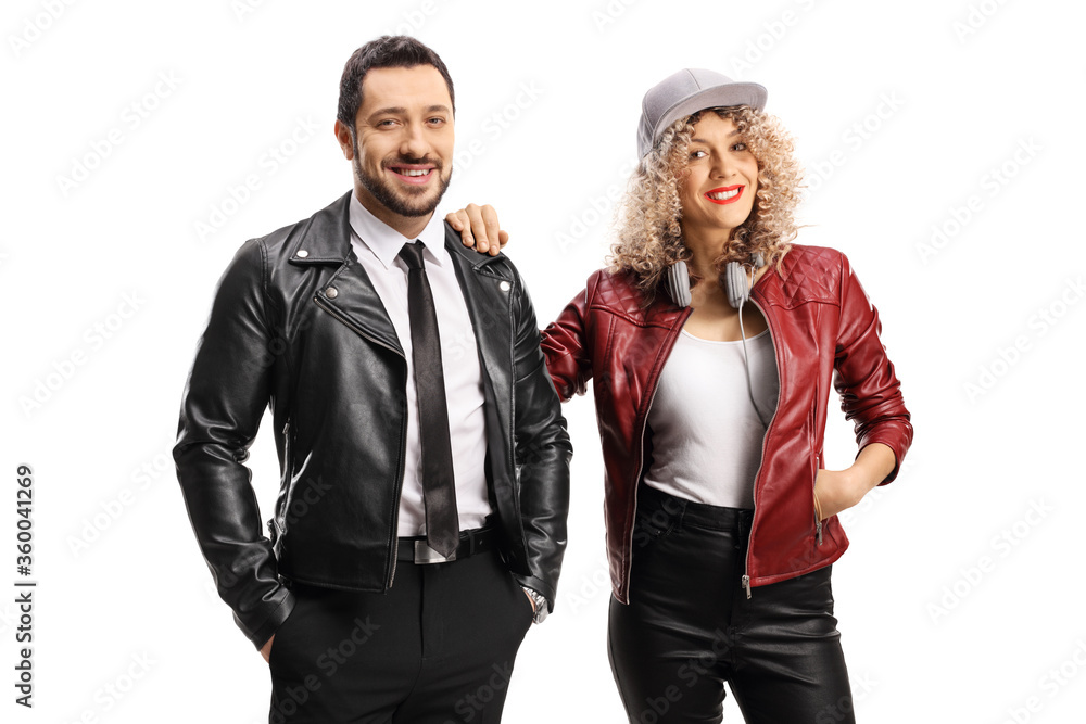 Young man and woman in leather jackets posing togeather