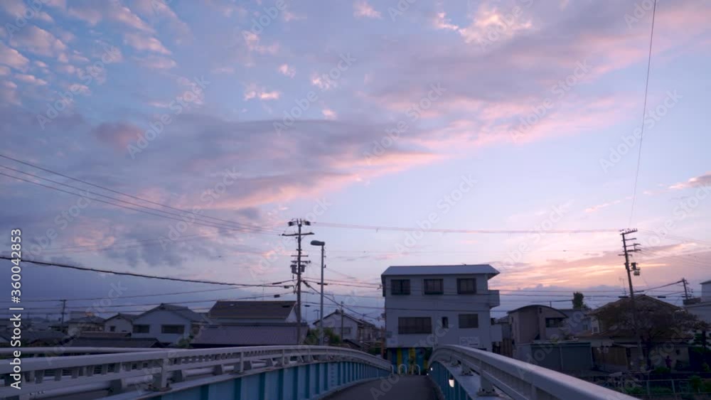 Purple clouds over downtown Wazuka Japan at Dawn, Slow-motion Purple clouds over downtown Wazuka Japan at Dawn, Slow-motion