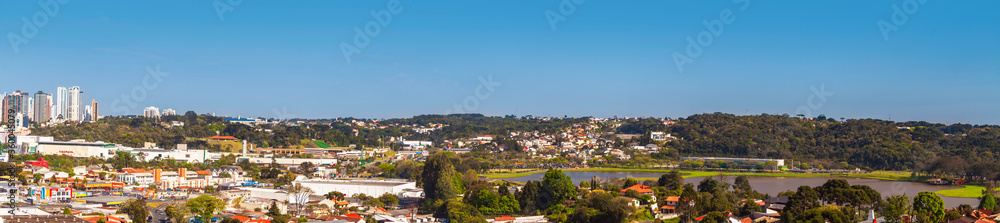 Curitiba, Parana, Brazil - 21 September 2013: Panoramic view from city park. Barigui Park and surroundings in a sunny day. Urban cityscape. Modern city in South America.