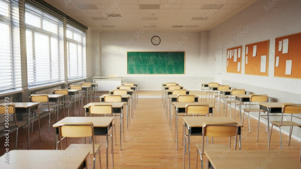 Empty classroom with chalkboard and rows of desks with chairs. Break at school. Empty classroom with chalkboard and rows of desks with chairs. Break at school.