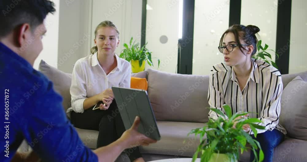 Business people connected on internet network with a tablet in a relax room. concept of startup company